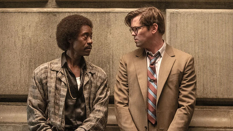 Mo and Blair looking at each other on Black Monday