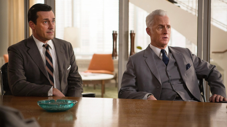 Don and Roger sitting in the conference room looking skeptical on Mad Men
