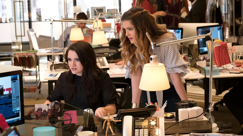 Jane and Sutton looking at a computer at work on The Bold Type