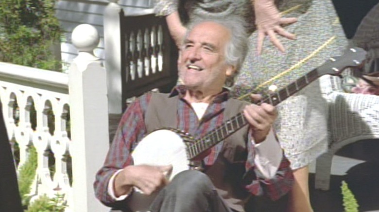 The Caretaker in Star Trek: Voyager playing a banjo