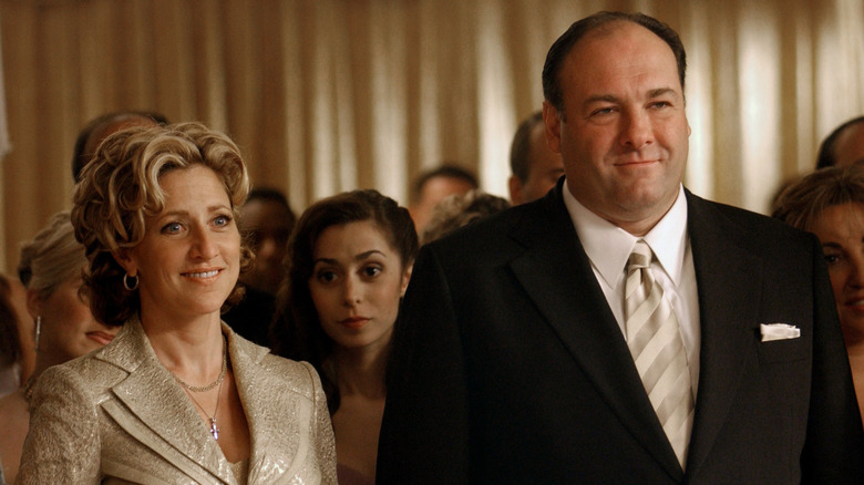 Carmella and Tony Soprano smiling in "The Sopranos"