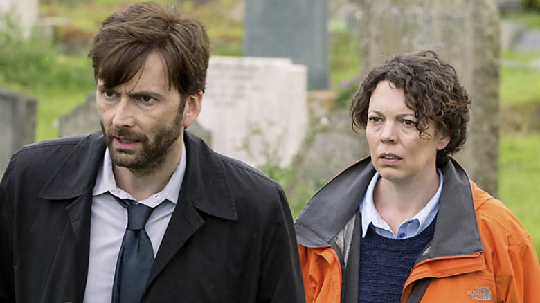 DI Hardy and DS Miller in a rainy cemetery in "Broadchurch" (2013-2017)