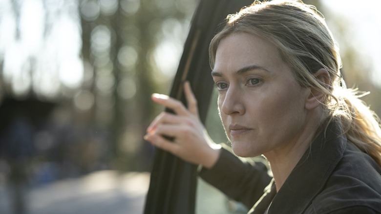 Mare looking on in "Mare of Easttown" (2021)