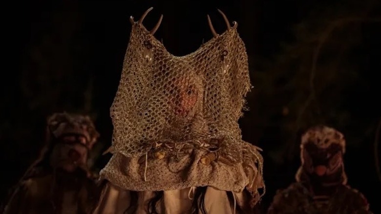 Shauna dressed in ceremonial attire for the human hunt in "Yellowjackets" (2021-present)