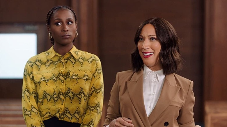Issa rae left of Robin Thede who's smiling