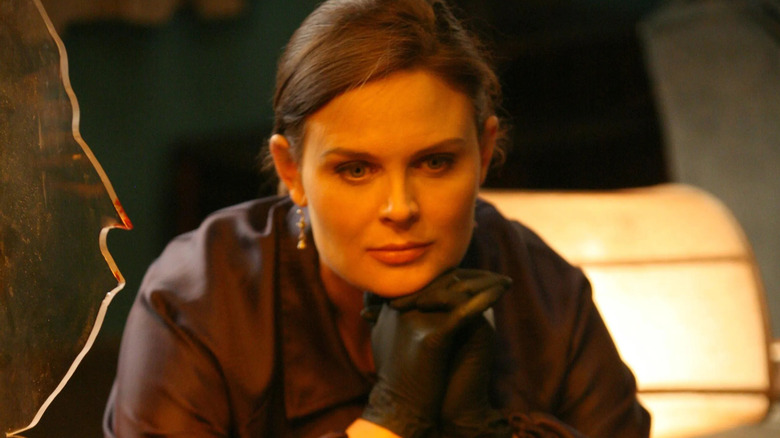 Brennan resting her chin on her hands in "Bones."