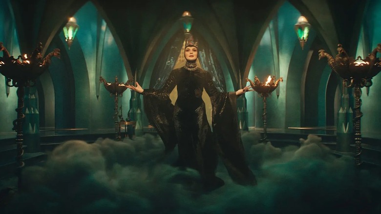 The Evil Queen talking to her Magic Mirror in Snow White (2025)