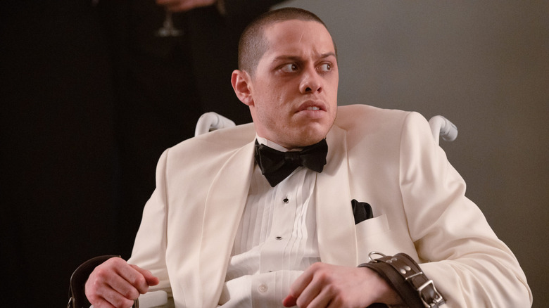 Max all chained up in The Home (2025)