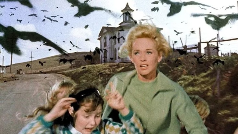 Melanie and children fleeing the birds