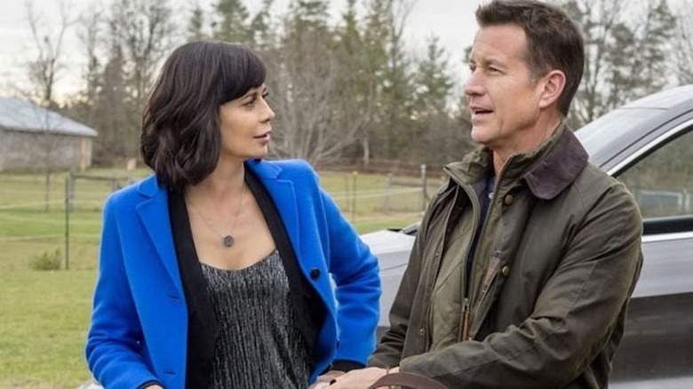 Cassandra and Sam talk outside their car in "Good Witch" (2015-2021)