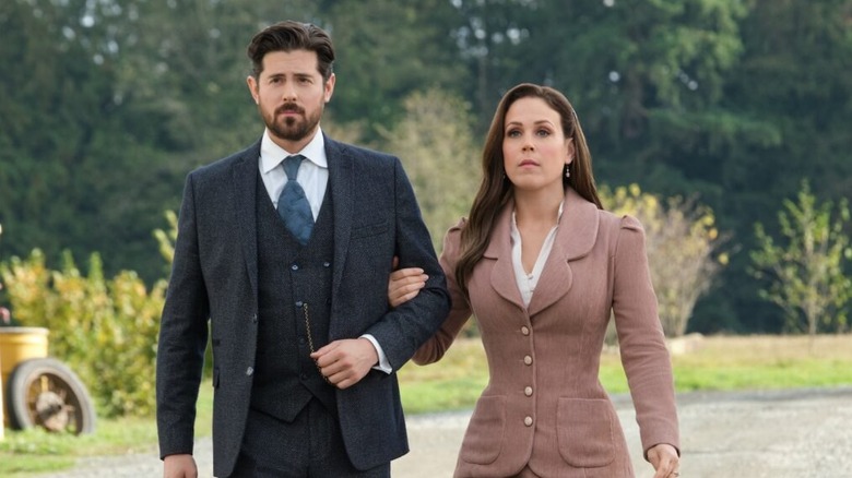 Molly and Lucas walk down a dirt road in "When Calls the Heart" (2014-present)