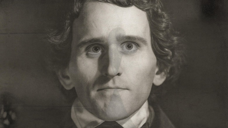 Black and white Harry Melling as Poe