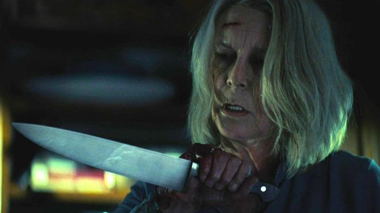 Jamie Lee Curtis holding a knife in "Halloween Ends"