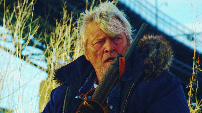 Hobo holding shotgun