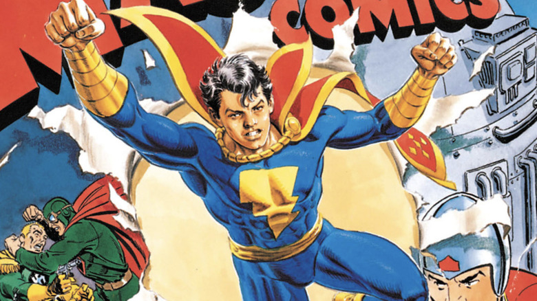 Captain Marvel Jr. tearing through a comic book