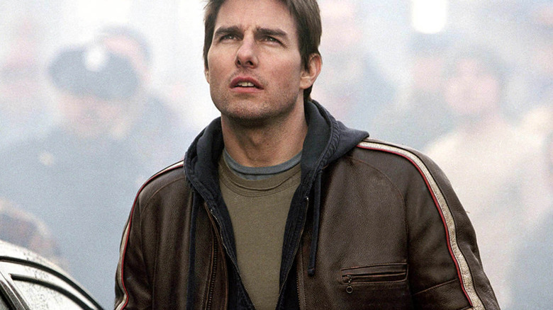 tom Cruise surveying his surroundings