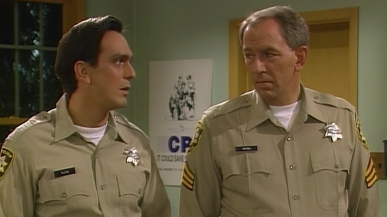 Two cops looking at each other