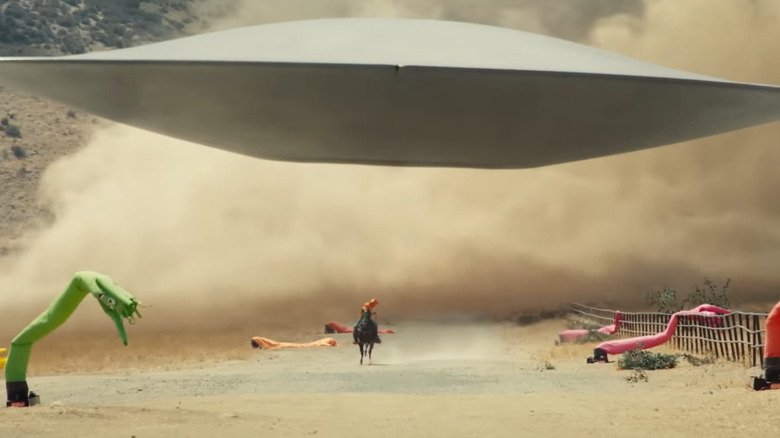 Nope's UFO chasing a man on horseback