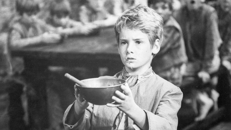 Oliver Twist asks for more gruel in 'Oliver!' (1968)