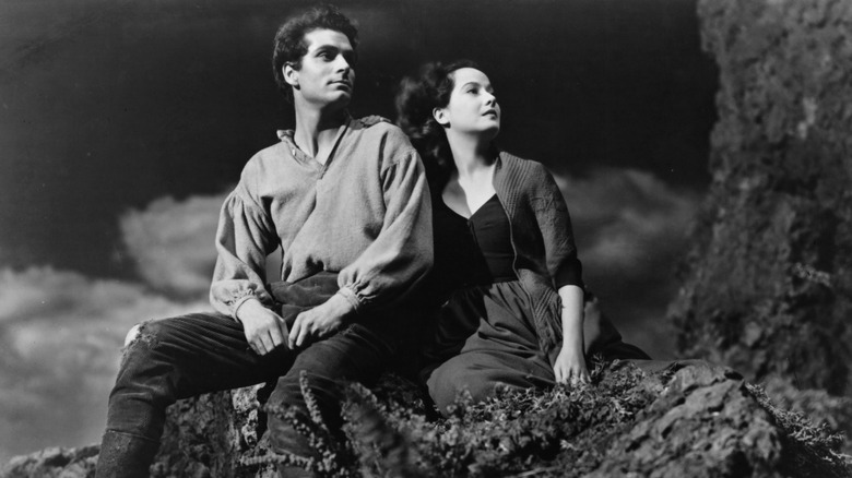 Heathcliff and Catherine sit on a mountaintop in 'Wuthering Heights' (1939)