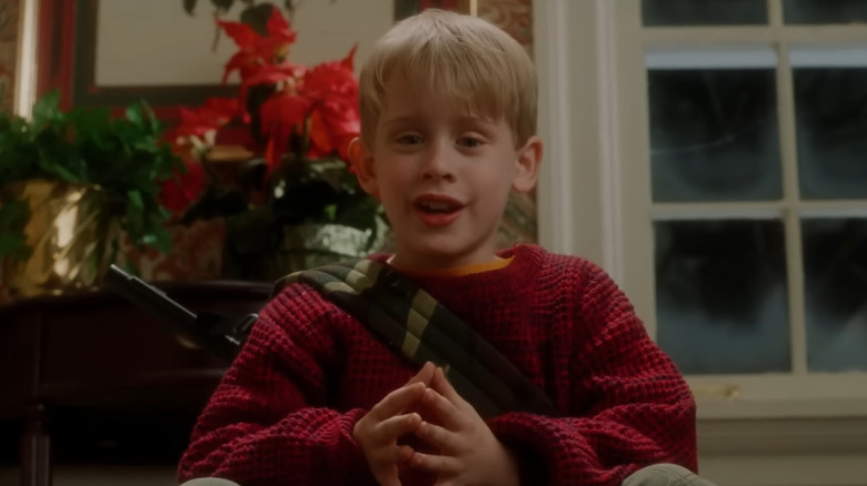 Kevin sitting and talking in Home Alone