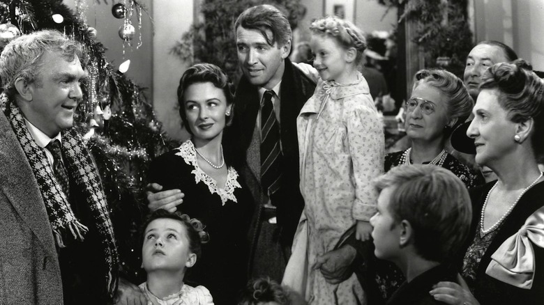 Geroge surrounded by friends and family in It's a Wonderful Life