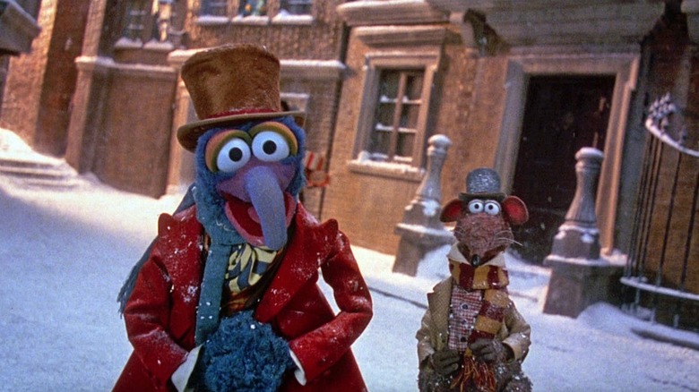 Gonzo and Rizzo talk to the audience on a snowy street in The Muppet Christmas Carol