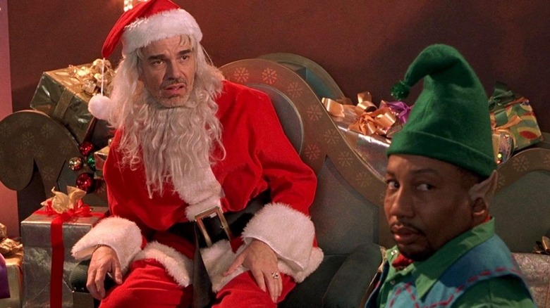 Willie and Marcus dressed as Santa and an elf in "Bad Santa" (2003)