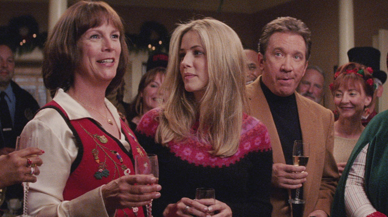 Nora, Blair, and Luther Krank during a toast in "Christmas with the Kranks" (2004)