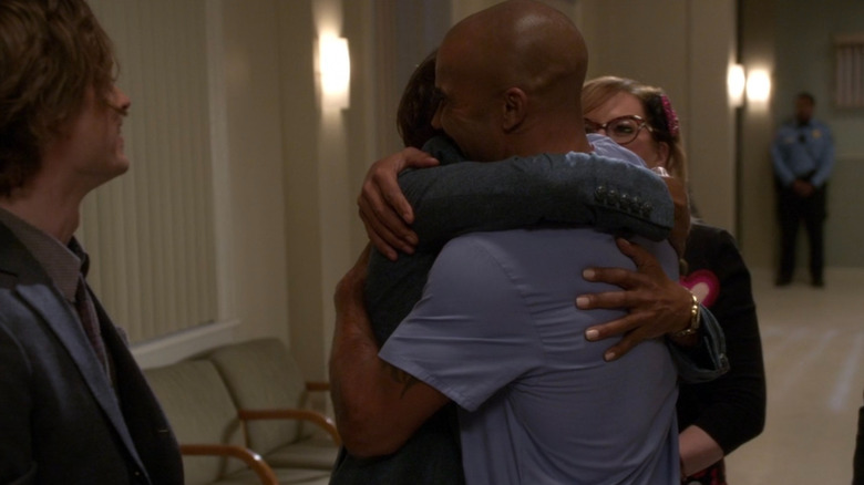 The BAU congratulating Morgan with hugs in a hospital waiting room