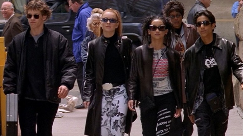 Jack Downey walks next to Lexy Gold, Jennifer, and Gabe in Get a Clue