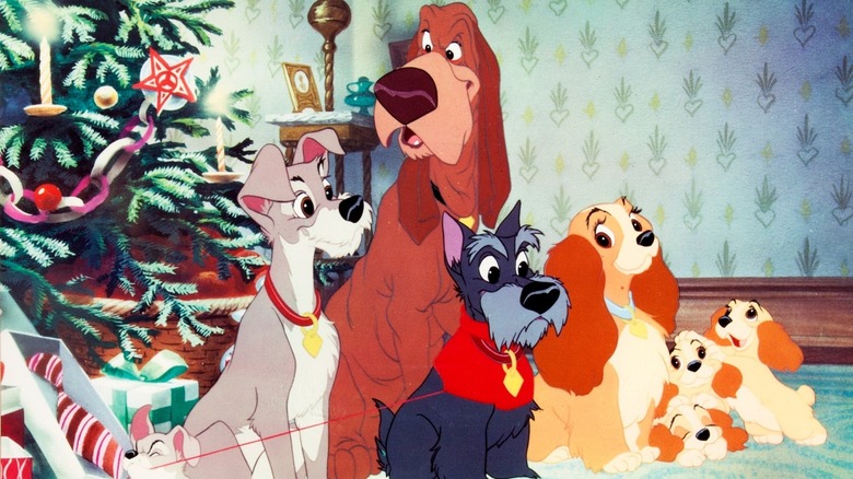All the dogs lined up by a Christmas tree in "Lady and the Tramp" (1955)