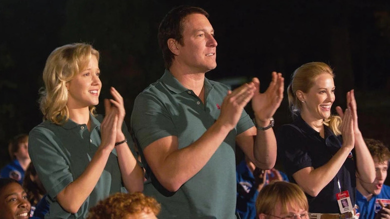 Mike cheers on his students from the stands.