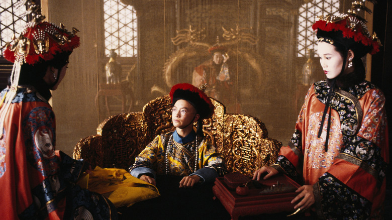 Puyi confers with Wanrong in "The Last Emperor" (1987)