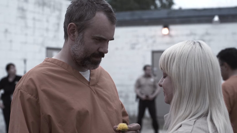 Vicky White receives flowers in "Bad Romance: the Vicky White Story" (2024)