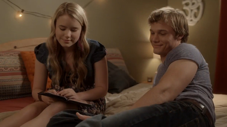 Angela and Chad enjoy some literature in "Stalked at 17" (2012)