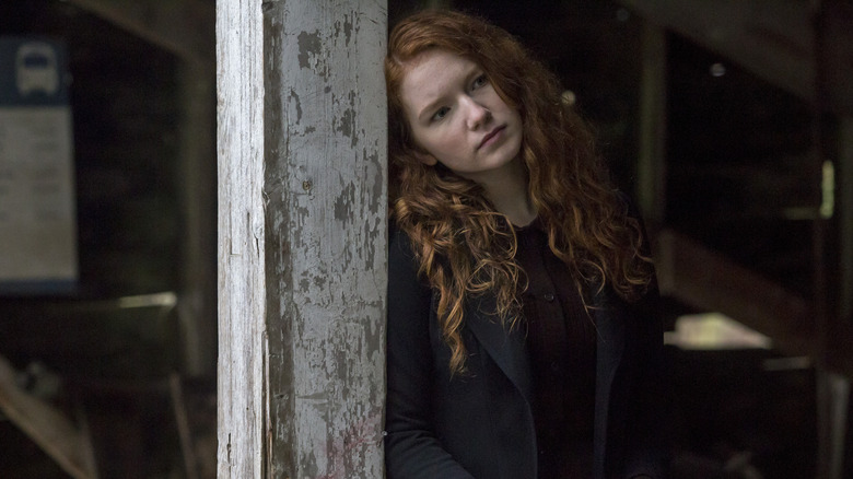 Heaven Casteel leans against a pillar in "V.C. Andrews' Heaven" (2019)