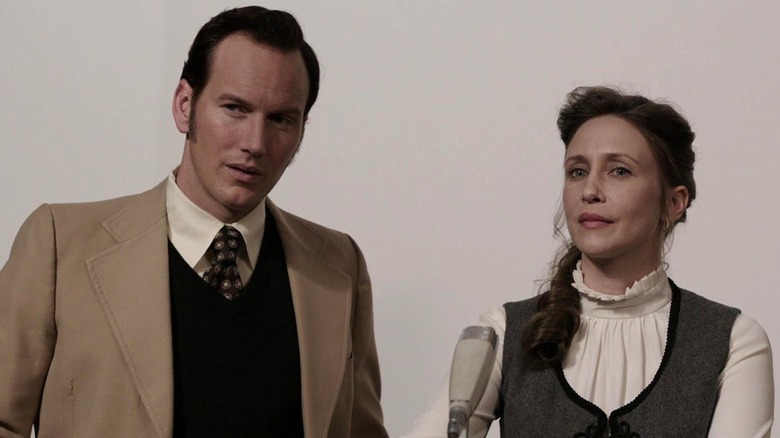 Ed and Lorraine Warren look skeptical in The Conjuring