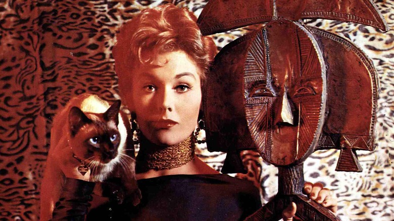 Gillian Holroyd sits with her cat in "Bell, Book and Candle" (1958)