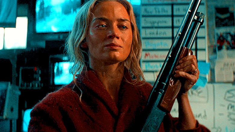 Evelyn holds a shotgun in A Quiet Place