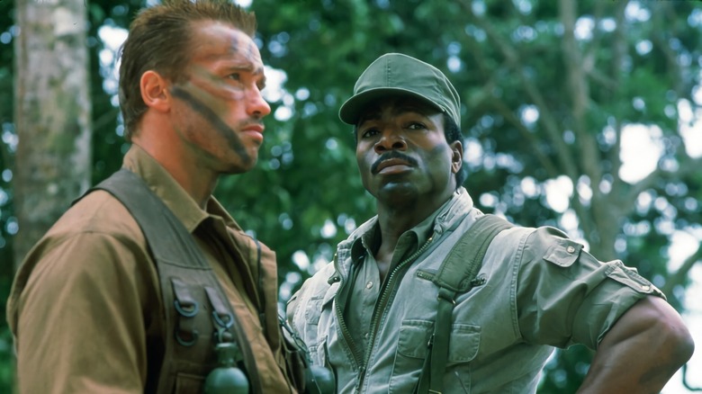 Dutch and Al standing in forest in Predator (1987)