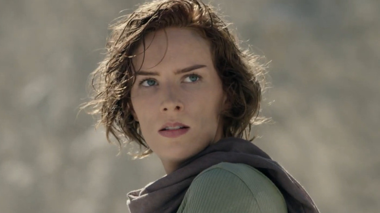 Kate looks over her shoulder in The Lair