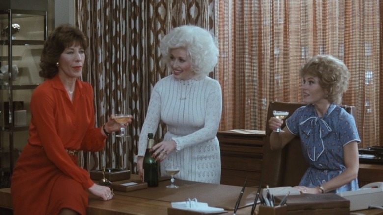 Violet, Doralee, and Judy toasting to a job well done in 9 to 5