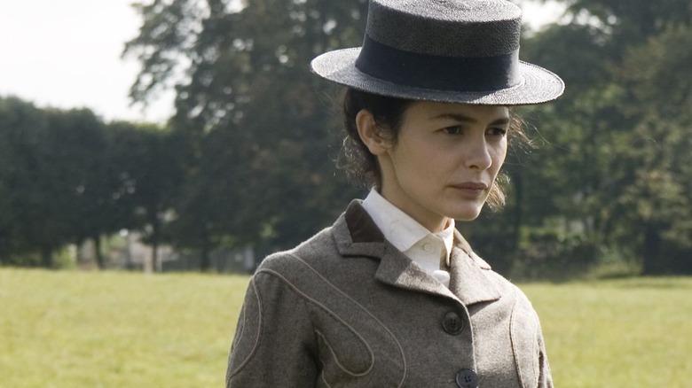 Coco Chanel in a tailored grey suit in Coco Before Chanel