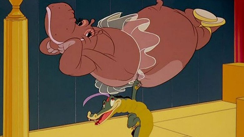 An alligator holds up a hippo in a tutu in Fantasia (1940)