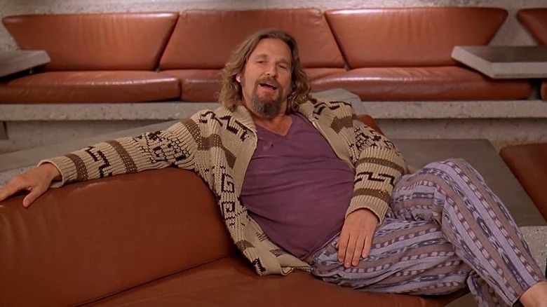 The Dude lounging on a leather couch in The Big Lebowski (1998)