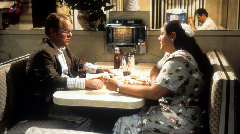 Allen and Kristina sit together at diner