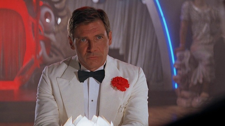 Indiana Jones wearing a white suit in Indiana Jones and the Temple of Doom