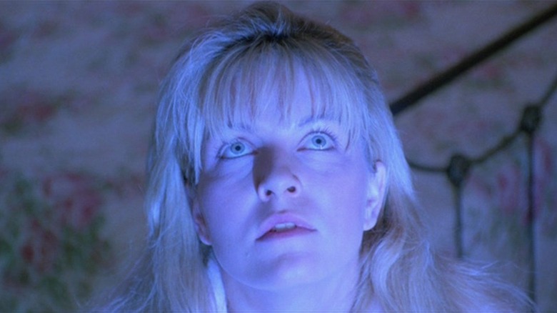 Laura Palmer illuminated at night in Twin Peaks: Fire Walk With Me