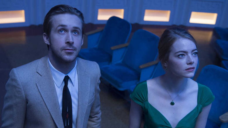 Seb and Mia looking up in the planetarium in La La Land